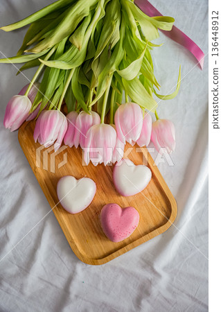 Full View Wooden Tray with Heart Souffles and Tulips Full View Wooden Tray with Heart Souffles and Tulips 136448912