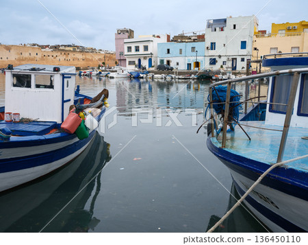 Bizerte, Tunisia - December 19, 2025: Walking along the pier of the Old Port in Bizerte, Tunisia 136450110