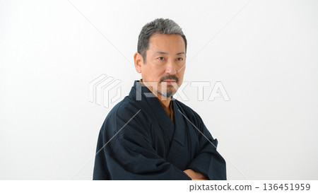 A man wearing a kimono 136451959
