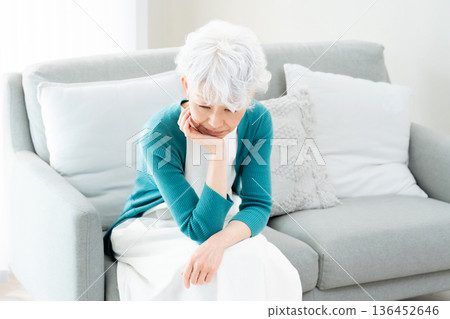 Senior woman worried about the future Senior woman worried about the future 136452646