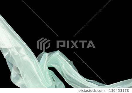 Off White Organza fabric flying in curve shape, Piece of textile White Organza fabric throw fall in air. Black background isolated motion blur Off White Organza fabric flying in curve shape, Piece of textile White Organza fabric throw fall in air. Black background isolated motion blur 136453178