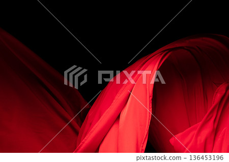 Red Cotton fabric flying in curve shape, Piece of textile Red cotton fabric throw fall in air. Black background isolated, dark shading environment Red Cotton fabric flying in curve shape, Piece of textile Red cotton fabric throw fall in air. Black background isolated, dark shading environment 136453196