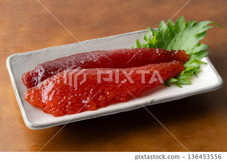 Sockeye salmon roe (beni roe) served on a plate 136453556