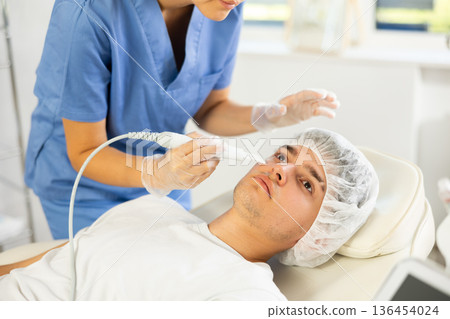 Using Skin Scrubber attachment Using Skin Scrubber attachment 136454024