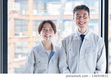 Portrait of a worker working at a construction site Portrait of a worker working at a construction site 136454631