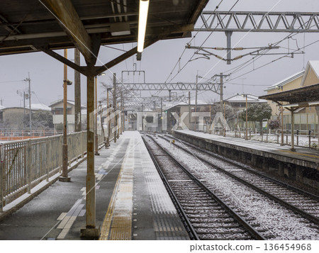 Snowing train station 136454968