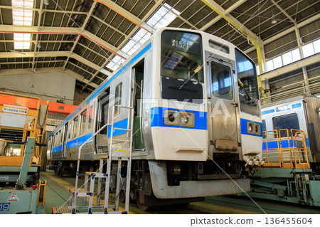 A 415 series train undergoing inspection at the Kokura General Rolling Stock Center (JR Kyushu) 136455604