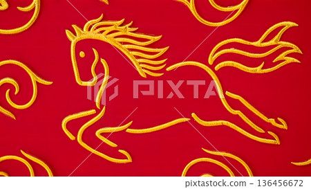 Embroidered Yellow Horse Design on Vibrant Red Fabric Background 136456672