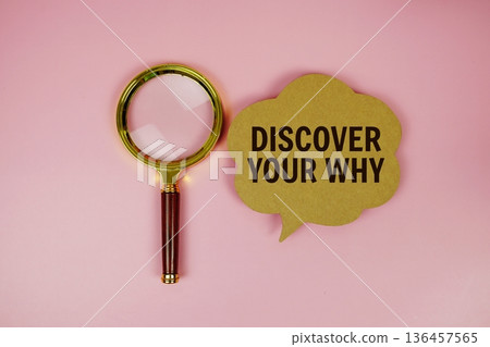 Discover Your Why text on speech bubble with magnifying glass on pink background 136457565