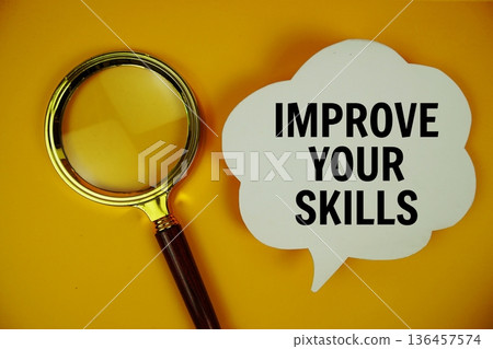 Improve Your Skills text on speech bubble with magnifying glass on yellow background 136457574