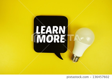 Learn More text with light bulb on yellow background Learn More text with light bulb on yellow background 136457602