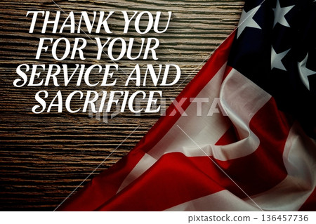 Thank You For Your Service And Sacrifice text with American USA Flag on wooden background 136457736