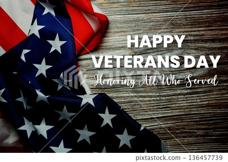 Happy Veterans Day and Honoring All Who Served text with American USA Flag on wooden background 136457739