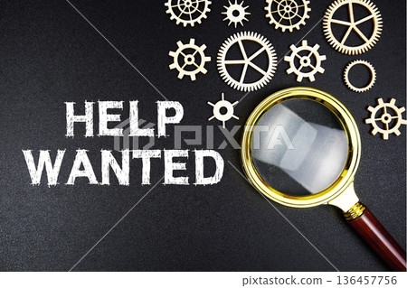 Help Wanted text message with magnifying glass on black background 136457756