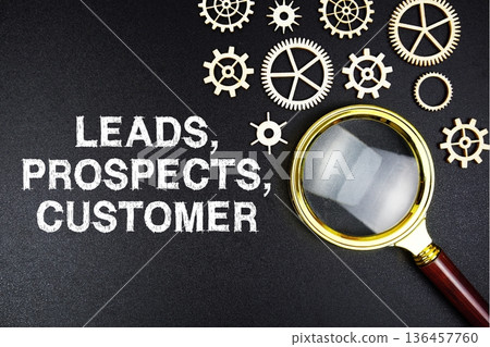 Leads, Prospects, Customer text message with magnifying glass on black background Leads, Prospects, Customer text message with magnifying glass on black background 136457760