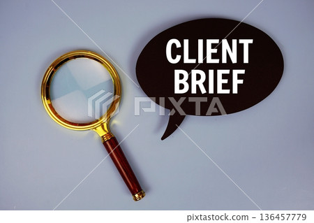 Client Brief text on speech bubble with magnifying glass on blue background 136457779