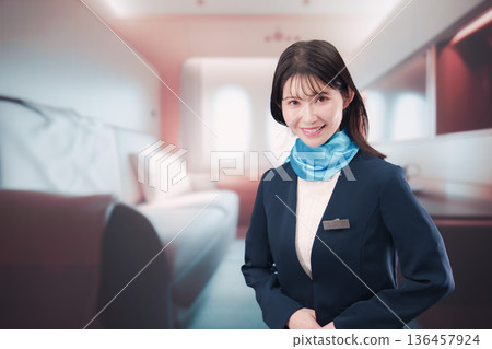 cabin attendant in charge of first class on an airplane 136457924