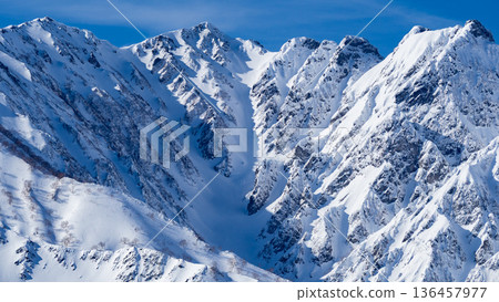 Winter scenery: Snow-capped Northern Alps, Hakuba Village, Nagano Prefecture 136457977