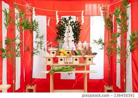 Image of a Shinto priest offering a prayer at a Japanese ceremony such as a ground-breaking ceremony 136458391