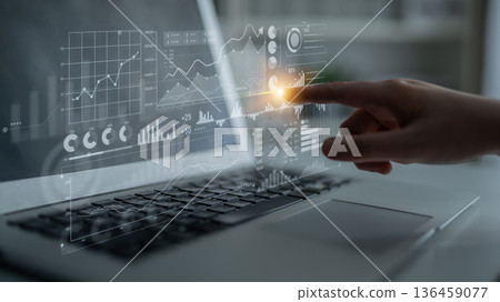 Futuristic User Interface with Data Visualization on Laptop Screen Being Touched by Hand for Modern Technology and Business Analysis Concepts Scalp Futuristic User Interface with Data Visualization on Laptop Screen Being Touched by Hand for Modern Technology and Business Analysis Concepts Scalp 136459077