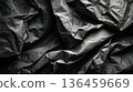 Crumpled black paper texture with soft shadow wrinkles 136459669