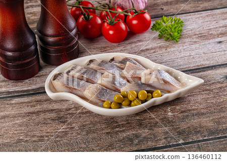 Slided marinated salted herring fillet Slided marinated salted herring fillet 136460112