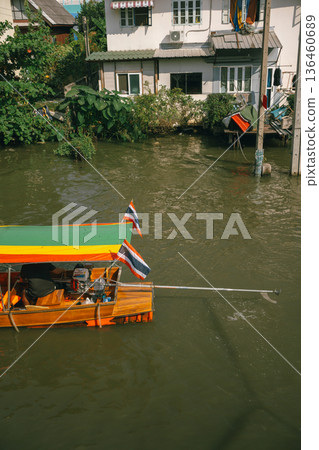 asia travel with people travel and take picture with large buddhist and beautiful temple with river at Bangkok Thailand in summer season asia travel with people travel and take picture with large buddhist and beautiful temple with river at Bangkok Thailand in summer season 136460689