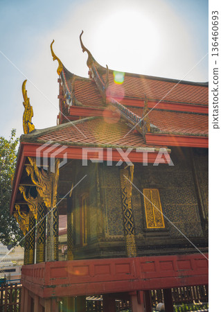 asia travel with large buddhist and beautiful temple with river at Bangkok Thailand in summer season 136460693