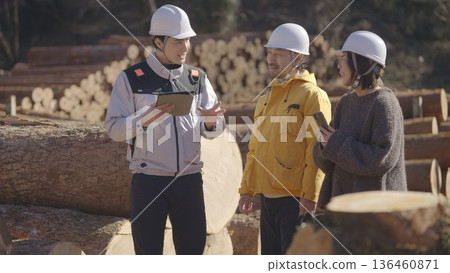 A couple taking a tour of building materials: Tama Wood Center Cooperative 136460871