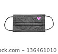 A black protective mask with a pink heart on a white background is a stylish protective accessory. 136461010
