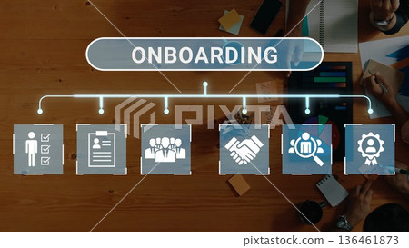 Visual Elements of Employee Onboarding Process with Icons and Data Charts on a Wooden Table in an Office Setting Gluon 136461873