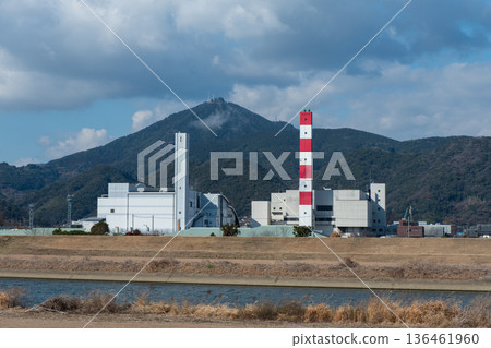Kumamoto City's Seibu Environmental Plant (waste incineration facility) stands out against the blue sky Kumamoto City's Seibu Environmental Plant (waste incineration facility) stands out against the blue sky 136461960