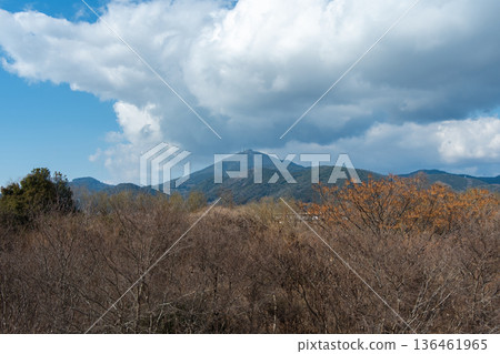 A distant view of Mount Kinpu in Kumamoto with blue skies and white clouds A distant view of Mount Kinpu in Kumamoto with blue skies and white clouds 136461965