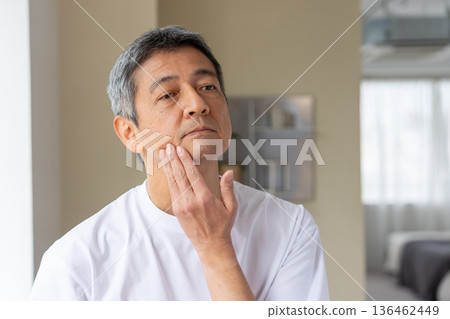 Senior man suffering from skin trouble Senior man suffering from skin trouble 136462449
