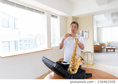 Senior men playing musical instruments 136462509