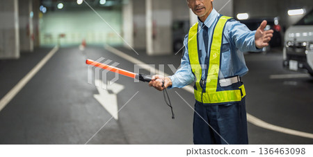 Security guard, traffic control officer, senior man 136463098