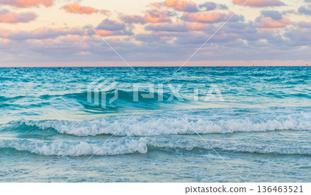 Sea horizon view. Cloudy sky and seascape at summer vacation. Skyscape with sea horizon. Calm horizon view at sea sunrise. Romantic summer vacation sunrise on seascape. Distant sea horizon 136463521