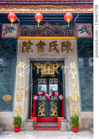 Vibrant Entrance of Chan She Shu Yuen Ancestral Hall, featuring Red Lanterns and Golden Carvings, Kuala Lumpur, Malaysia Vibrant Entrance of Chan She Shu Yuen Ancestral Hall, featuring Red Lanterns and Golden Carvings, Kuala Lumpur, Malaysia 136463786