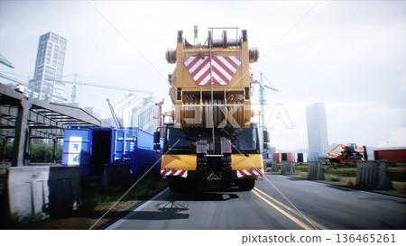 Mobile construction crane. Construction of a large industrial building ,modern industrial exterior. 3d rendering. 136465261