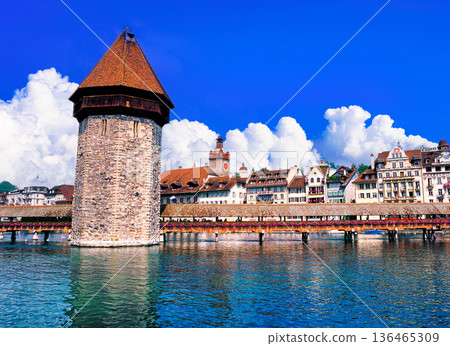 Flower-filled Chapel Bridge in Lucerne and cloud composition 136465309