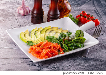 Dietary salad with salmon and avocado Dietary salad with salmon and avocado 136465572