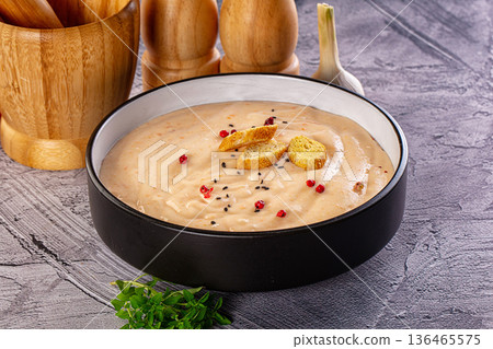 Tasty cheese cream soup with crouton Tasty cheese cream soup with crouton 136465575