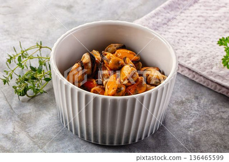 Peeled mussels heap in the bowl 136465599