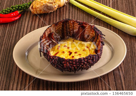 Baked sea urchin with cheese and egg Baked sea urchin with cheese and egg 136465650