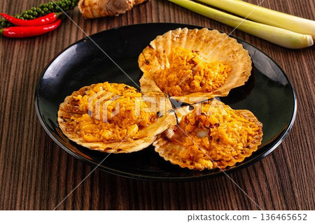 Luxury baked scallops with cheese Luxury baked scallops with cheese 136465652