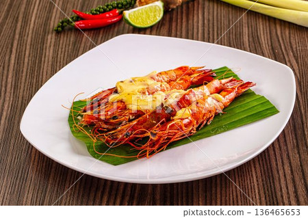 Baked tiger prawns with cheese Baked tiger prawns with cheese 136465653