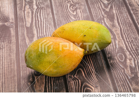 Sweet juicy ripe mango fruit Sweet juicy ripe mango fruit 136465798