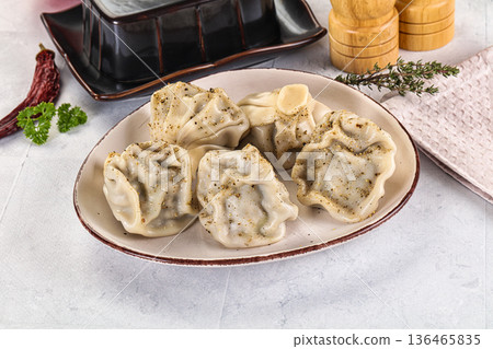 Georgian stuffed meat dumplings Khinkali Georgian stuffed meat dumplings Khinkali 136465835