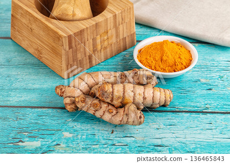 Fresh aroma tumeric roots heap Fresh aroma tumeric roots heap 136465843