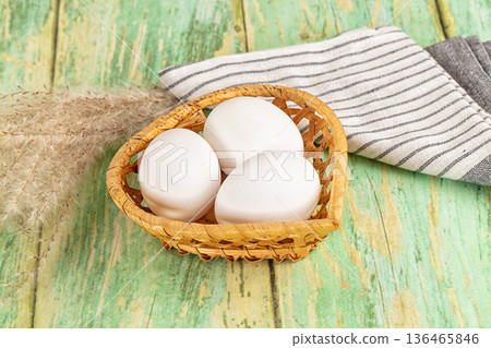 Raw white uncooked chicken eggs Raw white uncooked chicken eggs 136465846